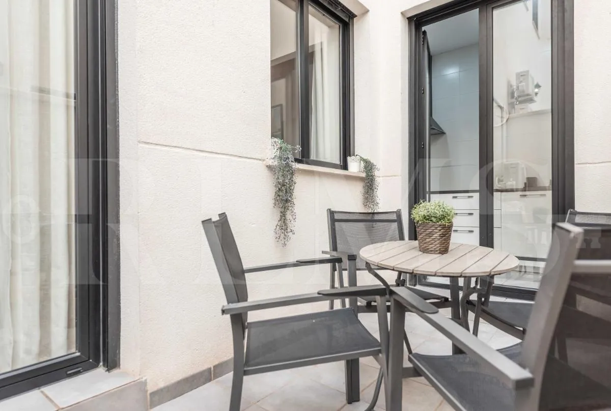 Image 4 of 3BR apartment with community pool, parking and patio – Center by REMS