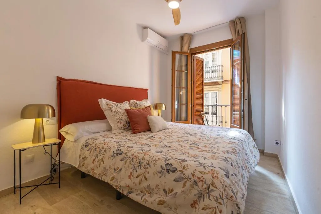 Image of Bright apartment with patio and balconies in the center